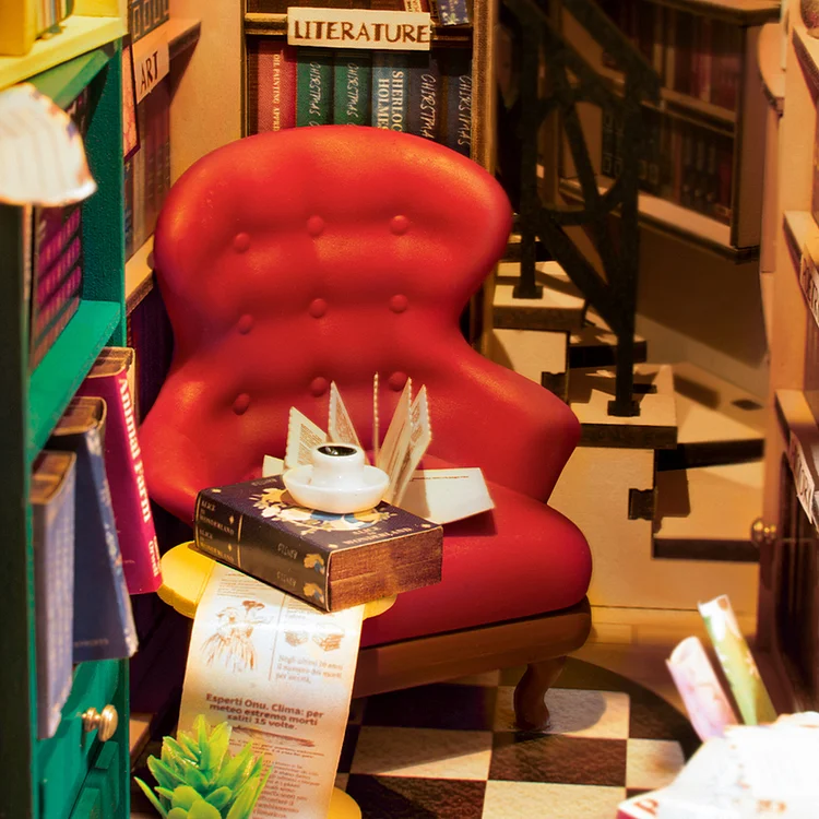 DIY Bookstore Book Nook Kit by Diokits - Detailed View Of A Chair Inside The Bookstore