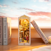 DIY Sunshine Town Book Nook Kit by Diokits - Front View in Middle of Books with Sunset in Background