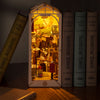 DIY Sunshine Town Book Nook Kit by Diokits in Middle of Books Showing the Lights