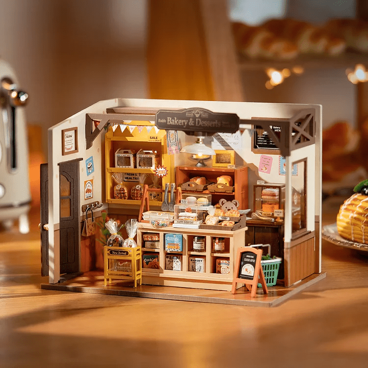 Becka's Baking House DIY Miniature Kit by Diokits - Front View In Bakery Background