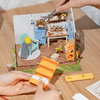 Dreamy Garden House DIY Miniature Kit by Diokits Being Assembled By Person Hands