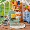 Dreamy Garden House DIY Miniature Kit by Diokits - Teal Chair With Yellow Pillow On Top