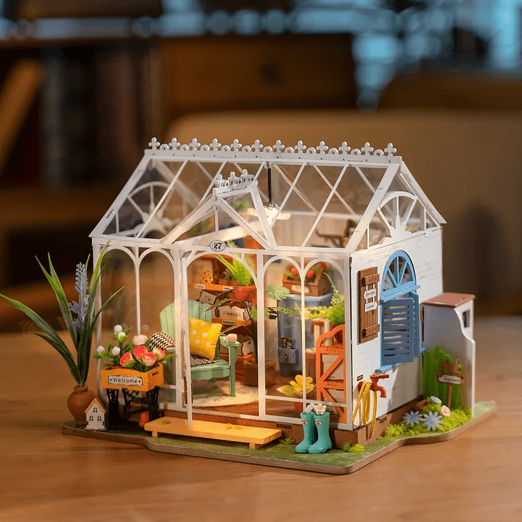 Dreamy Garden House DIY Miniature Kit by Diokits - Front View Of Product On Top Of Wooden Table