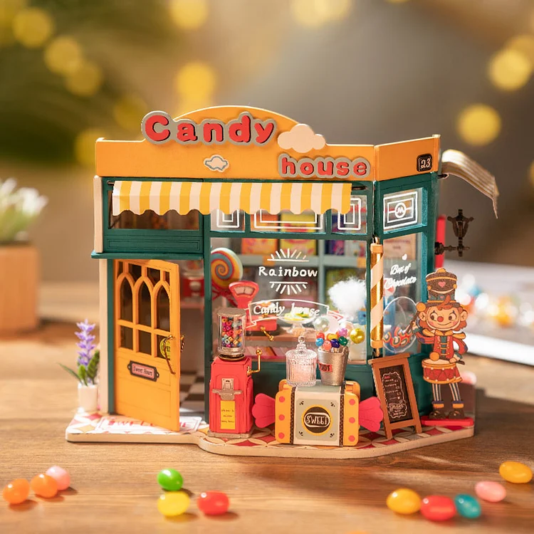 Rainbow Candy House DIY Miniature Kit by Diokits - Front View On Top Of Table With Candy In Front