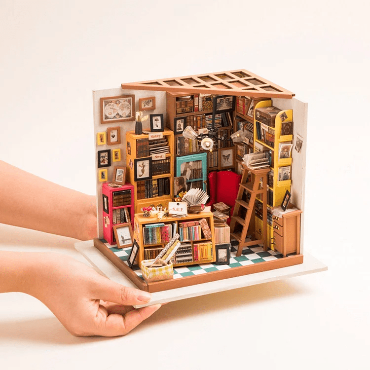 Sam's Study Library DIY Miniature House Kit by Diokits - Front View Of Hands Holding The Product